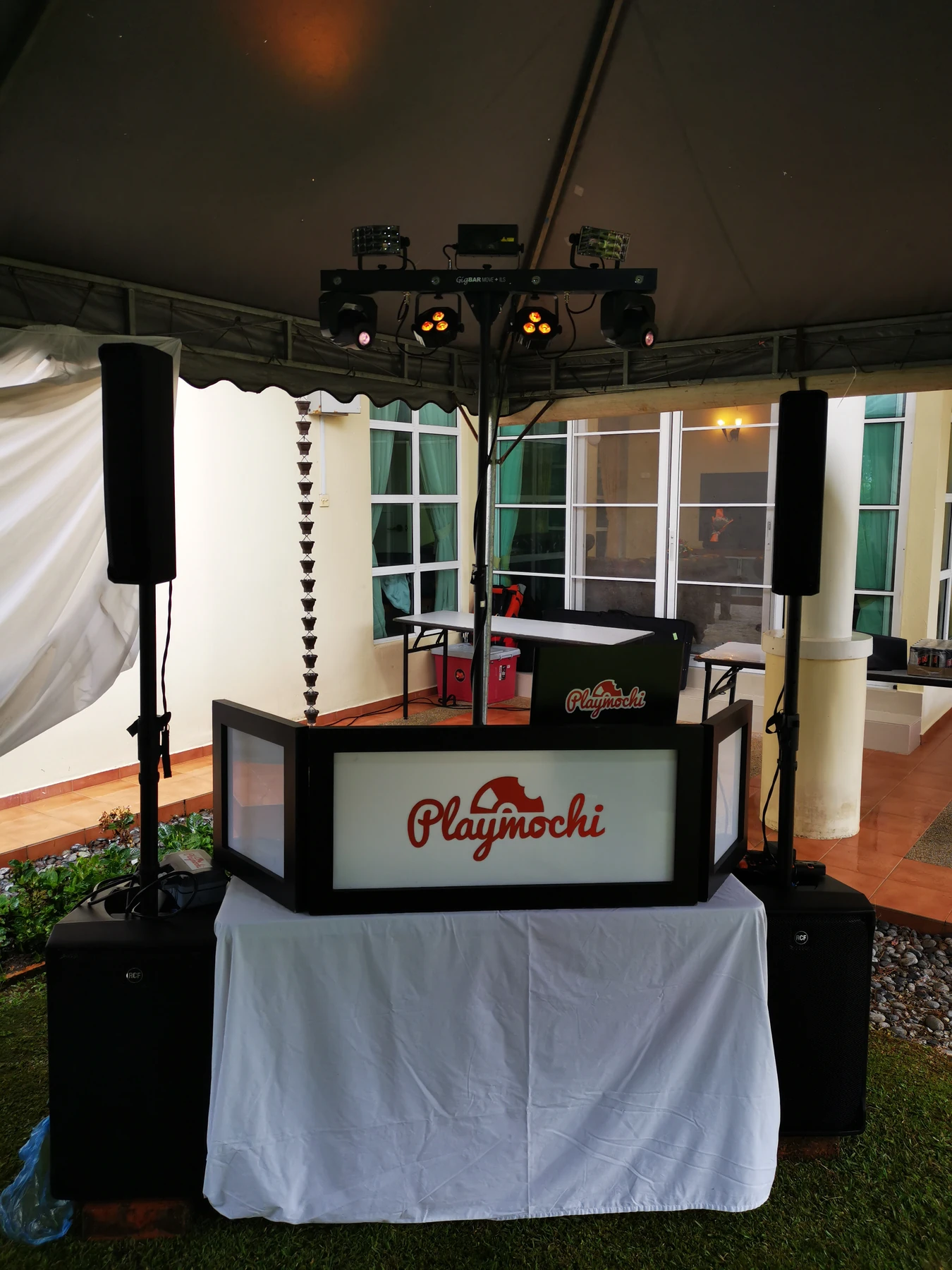 RCF Evox J8 column array speakers set up at an event